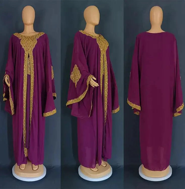 Mandotos two-piece gold kaftan abaya dress featuring elegant flowing fabric and intricate design details.