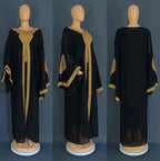 Mandotos two-piece gold kaftan abaya dress with flowing fabric and elegant design, perfect for stylish modest wear.