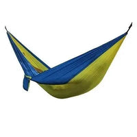 Mandotos Ultimate Oasis single and double hammock with colorful woven fabric and wooden spreader bars, ideal for relaxing outdoors.