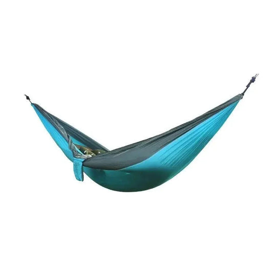 Mandotos Ultimate Oasis single double hammock shown in natural fabric, featuring sturdy ropes and a spacious design for relaxing outdoors.