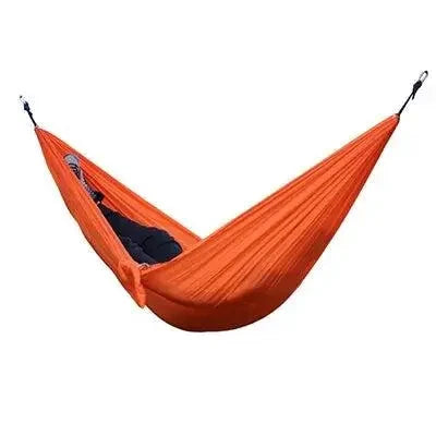 Mandotos Ultimate Oasis single and double hammock with sturdy ropes and spreader bars, ideal for relaxing outdoors.