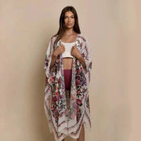 Mandotos Urban Blossom Kimono featuring floral pattern, lightweight fabric, and open front design perfect for casual or stylish wear.