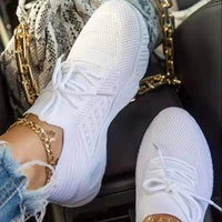 Mandotos walking shoes with breathable mesh upper and cushioned soles, designed for comfort and everyday wear.