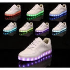 White MANDOTOS light-up shoes featuring illuminated soles and stylish design, ideal for kids and casual wear.