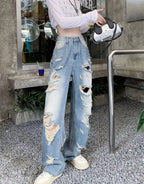 Plus size American Hole high waist straight-leg denim pants for women by MANDOTOS, showcasing fit and stylish design.