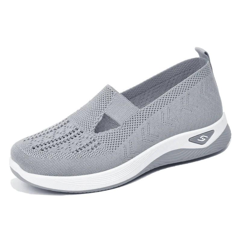 Women's airy mesh sneakers by MANDOTOS featuring lightweight design and breathable fabric for comfortable casual wear.