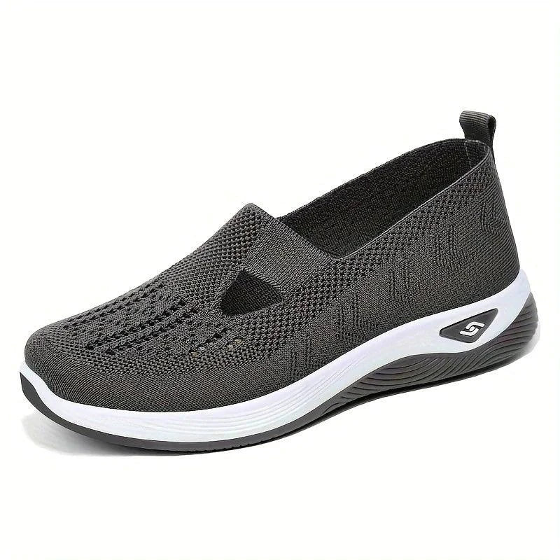 Women's airy mesh sneakers by MANDOTOS featuring breathable fabric and white sole, perfect for casual wear and active lifestyles.
