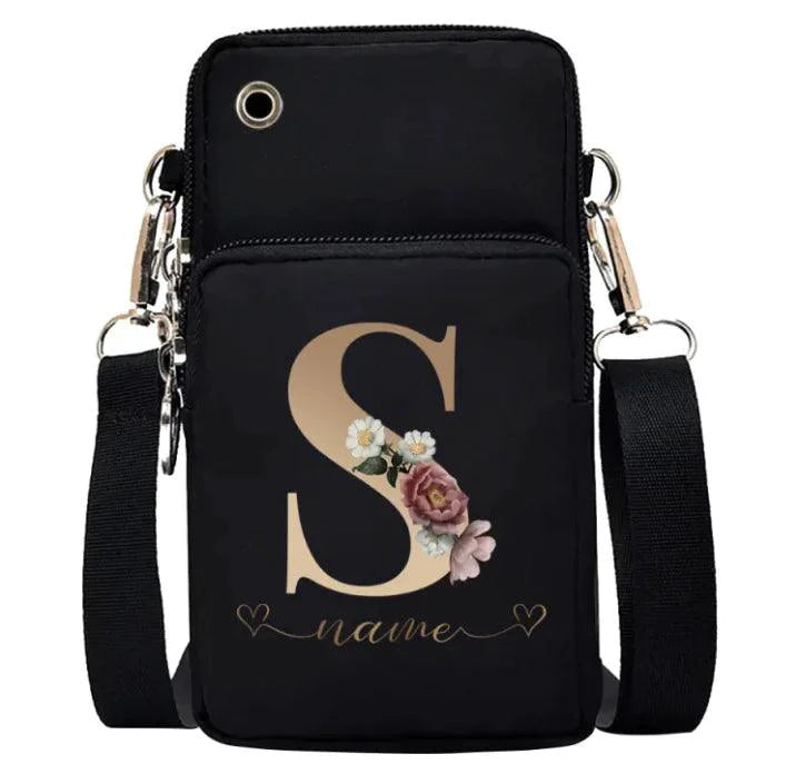 Women's genuine leather handbag by MANDOTOS, showcasing a portable stylish design with top handles and sleek finish.