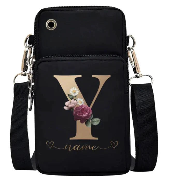 Women's genuine leather handbag by MANDOTOS featuring a portable, stylish design with top handles and sleek appearance.