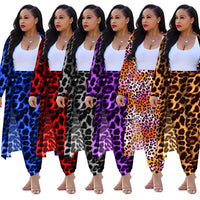 Women's long-sleeved leopard print suitcoat by MANDOTOS, stylish tailored blazer with bold animal print fabric.