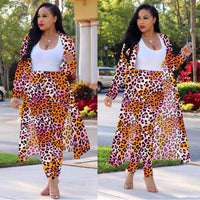 Women's long-sleeved leopard print suitcoat by MANDOTOS, stylish tailored blazer with bold animal print design.