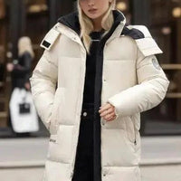 Women's thickened cotton padded winter coat by MANDOTOS, featuring a cozy, insulated design with a high collar and front pockets.